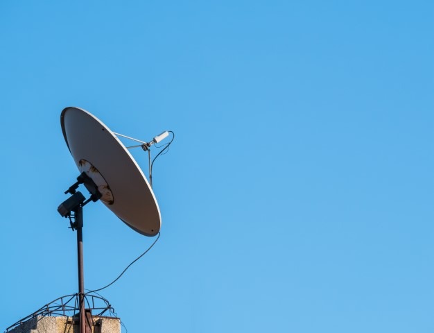 Satellite,Dish,Or,Parabolic,Antenna,On,The,Roof,Of,A